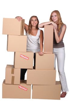 Girls surrounded by boxes