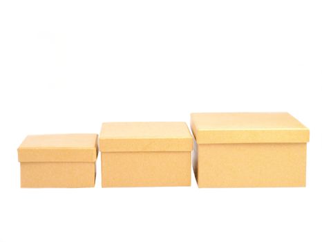 Three square paper boxes on white background