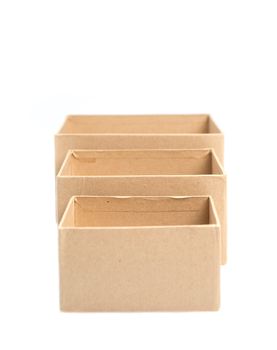 Three square paper boxes on white background