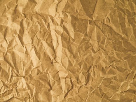 Yellow wrinkled paper as a background