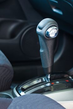 Automatic gear shift, close up, car interior