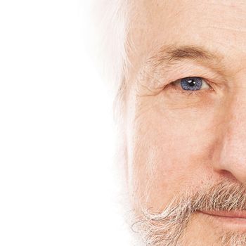 Portrait of handsome elderly man with beard on a white background