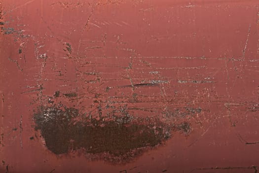 This is an old red rusty metal tank panorama (composition of many pictures to have a better resolution). A lot of scratch due to transportation.