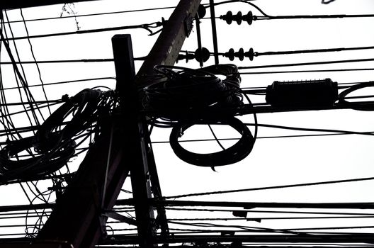 Muddle wire on electrictity post in Thailand