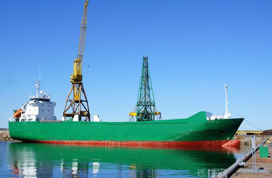 The cargo ship costs at a mooring