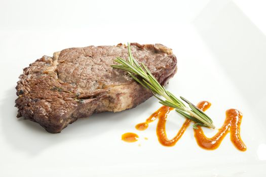 Grilled Sirloin steak with rosemary and sauce