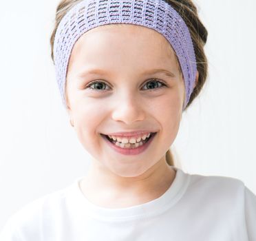 Closeup Portrait of smiling beautiful little girl