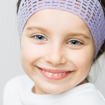 Closeup Portrait of cute smiling little girl