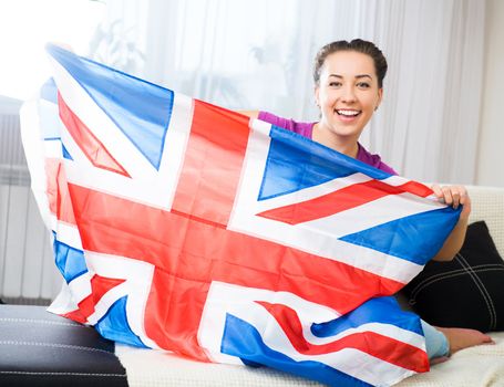 British woman holding the Jack Union flag