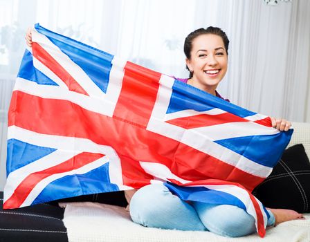 British girl holding the Jack Union flag