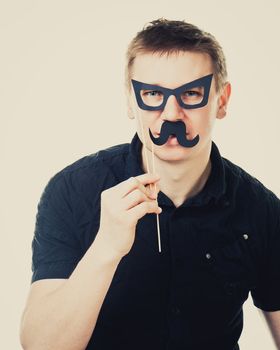 funny man with fake glasses and a mustache