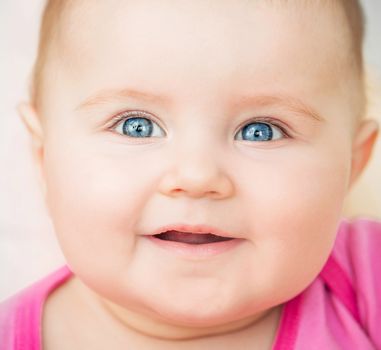 bright closeup portrait of adorable baby