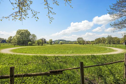 Meadows with abandoned race course in Chiemgau, Germany