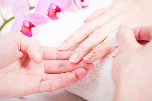 professional manicurist doing a manicure natural look 