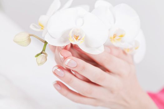 professional manicurist doing a manicure natural look 