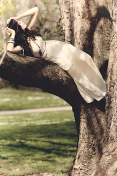 beautiful brunette woman relax outdoor in summertime 