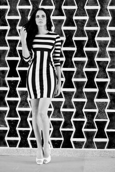 attractive young woman in sexy dress monochrome