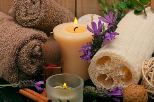 Spa scene with aromatic lavender, loofah and towels
