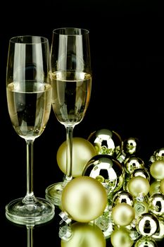 christmas decoration in gold and champagner on black background