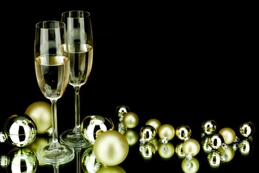 christmas decoration in gold and champagner on black background