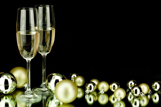 christmas decoration in gold and champagner on black background