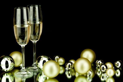 christmas decoration in gold and champagner on black background