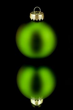 christmas decoration in green on black background