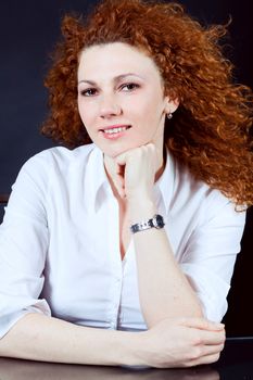 attractive young redhead woman emotion portrait ob black 