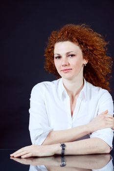 attractive young redhead woman emotion portrait ob black 