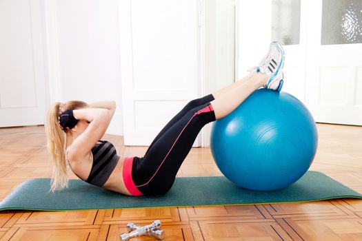attractive young woman doing fitness dumbbell workout sport