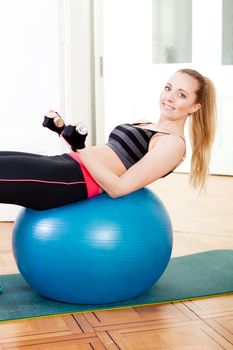 attractive young woman doing fitness dumbbell workout sport