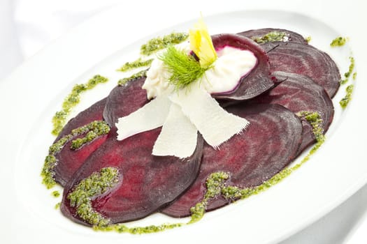 Vegetarian Beetroot Carpaccio w goat cheese and Pesto