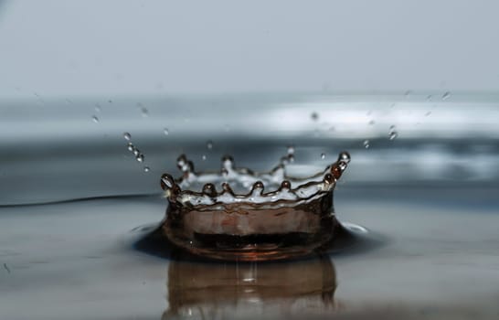 movement of a falling water drop red wine in fresh water