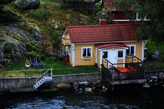 little house on the beach with jetty
