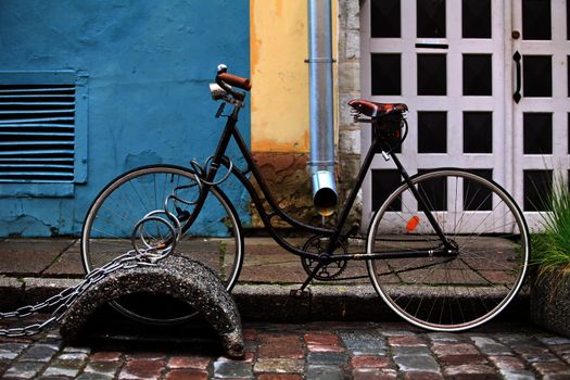 old bicycle on the lock close to