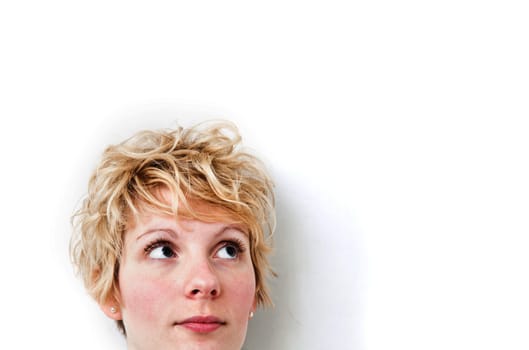 Young blond girl with morning look and mixed hairs on a white background