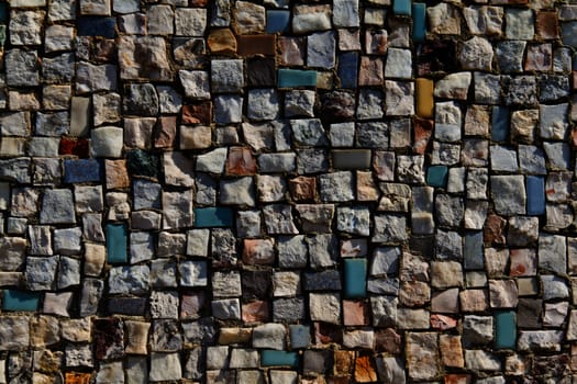 Mosaic Texture of little stone wall (close-up)