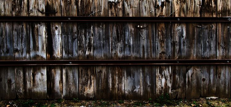 This is an old wood fence in old Montreal with rusty metal. Very contrasty texture with a lot of details.