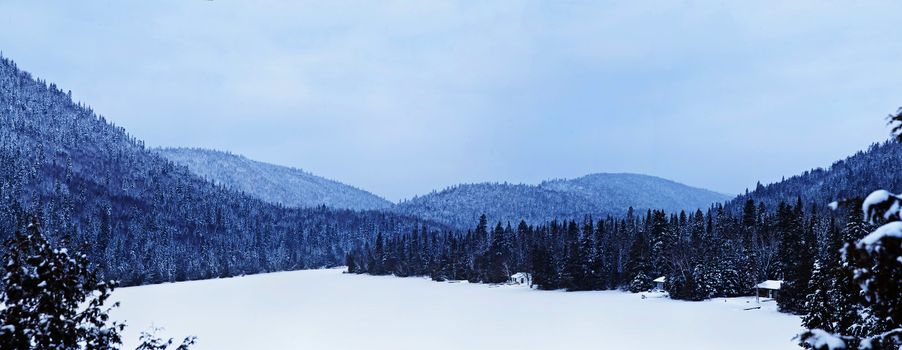 A very nice view of the mountains and of the little houses on the lake shore. This is a dream location.