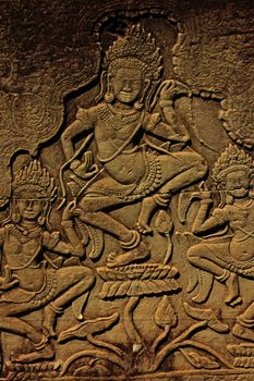 Apsara dancers wall carving, Bayon temple, Angkor area, Siem Reap, Cambodia