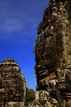 Stone faces of Bayon temple, Angkor area, Siem Reap, Cambodia