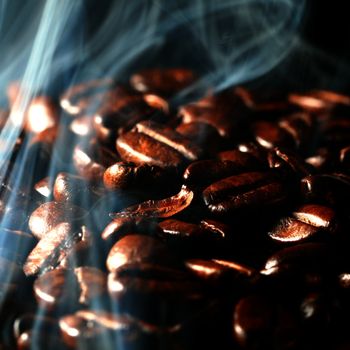 macro coffee beans in aroma smoke