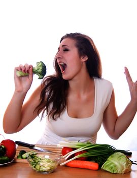 woman prepares a salad of broccoli in a hand holding a microphone