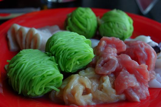raw meat and green noodle for cook food