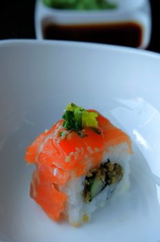 close up roll with  Cucumber inside. Salmon topped