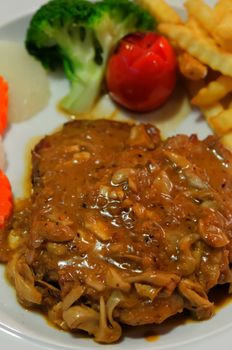 close up beef steak with vegetable and   french fries