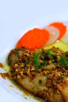 close up grilled fish with vegetable