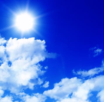 Blue sky with clouds and sun  