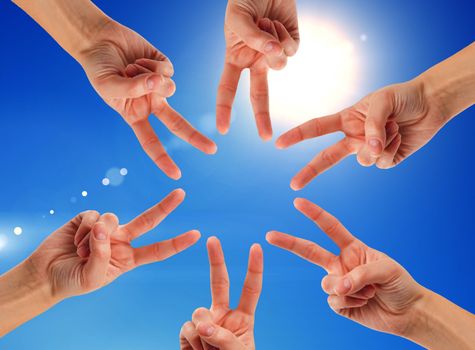 Hands of teamwork , forming the star shape
