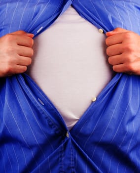 Cropped view of frustrated business man tearing off his shirt